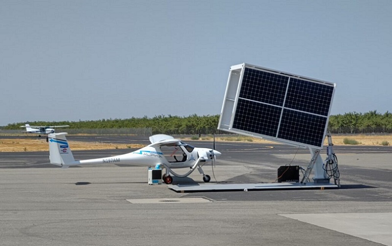 Alpha Electro charging at mobile solar station (1).jpg